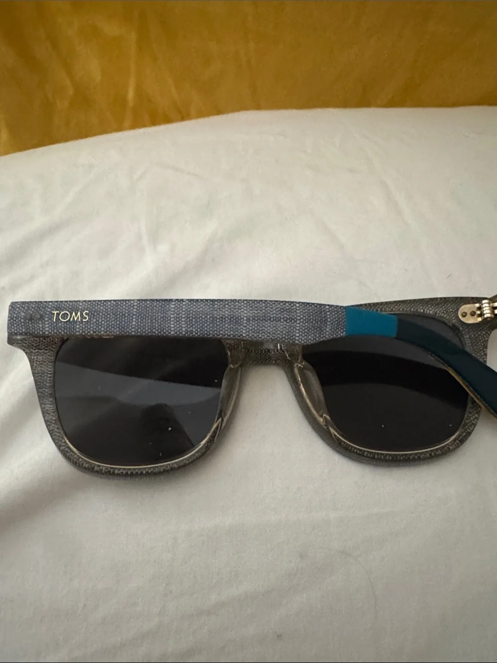 Tom’s sunglasses one for one